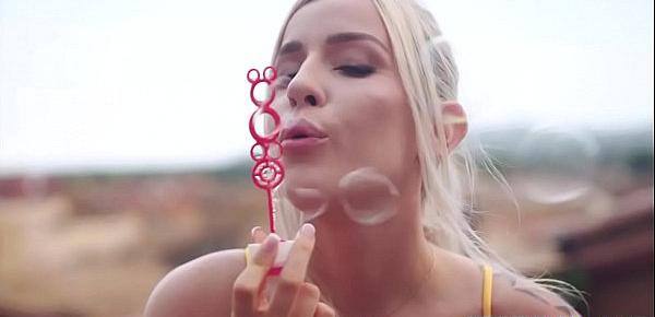  Sexy blonde Marica Chanelle playfully blows some bubble and sucking big dick